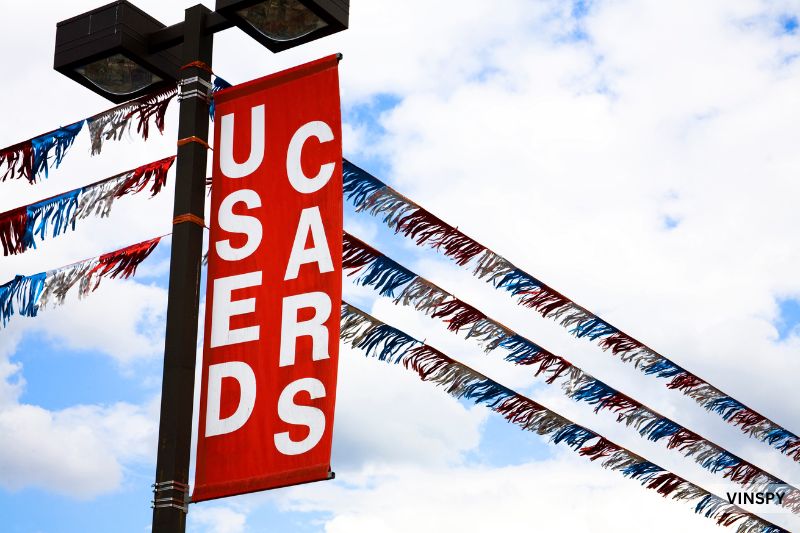 Used car lot banner suggesting where to check if a car has been in an accident.